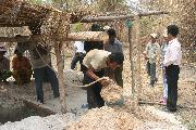 Man With Sand Dug For Well