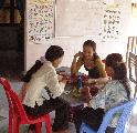 Girls Playing Game On Porch